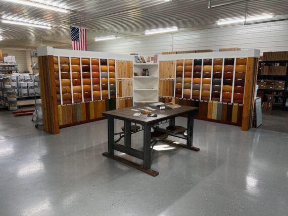 LogFinish showroom with wood finish samples and consultation table
